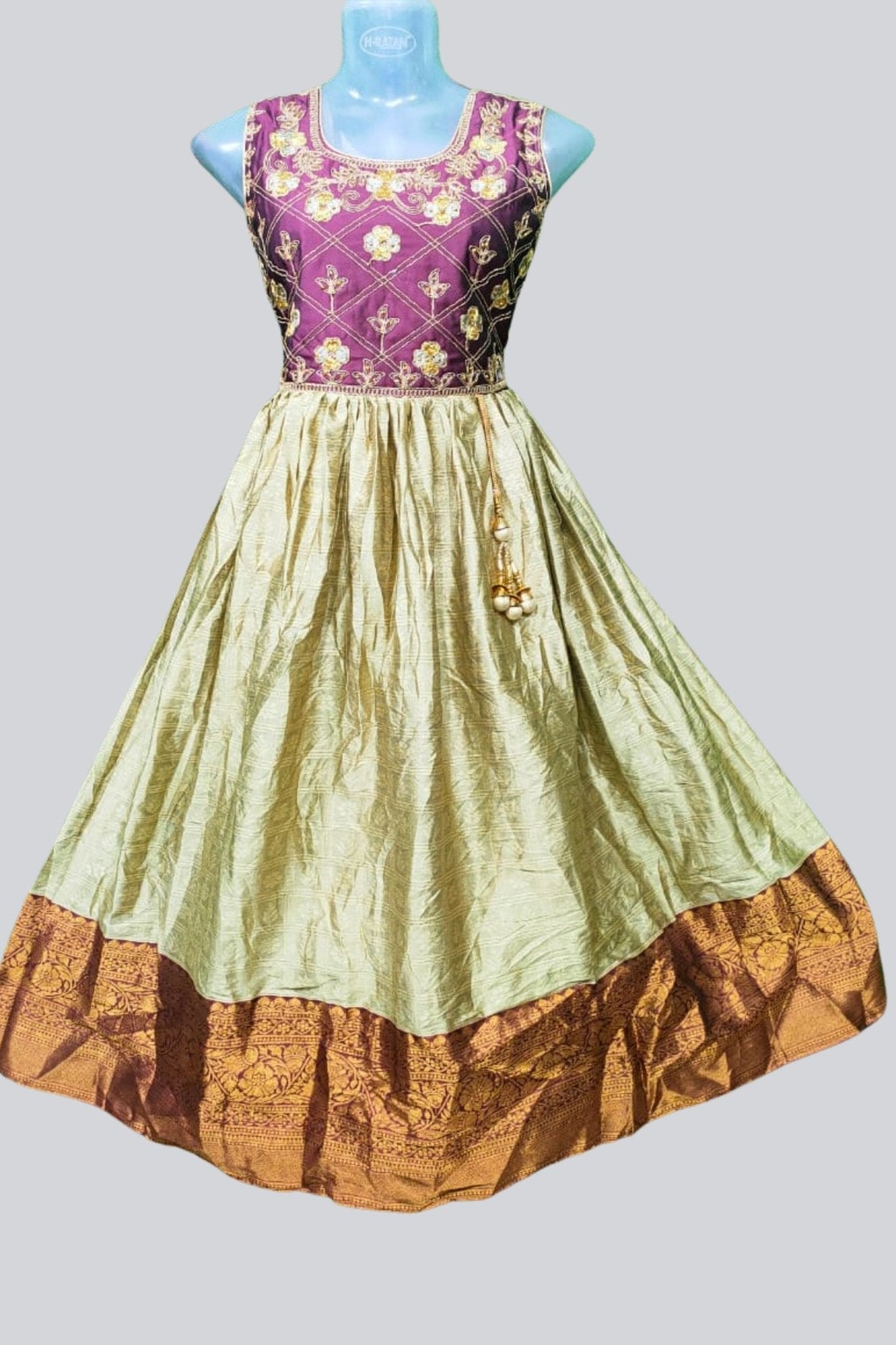 Best Onam 2026 outfits for girls — cream silk cotton frock from JCS Fashions