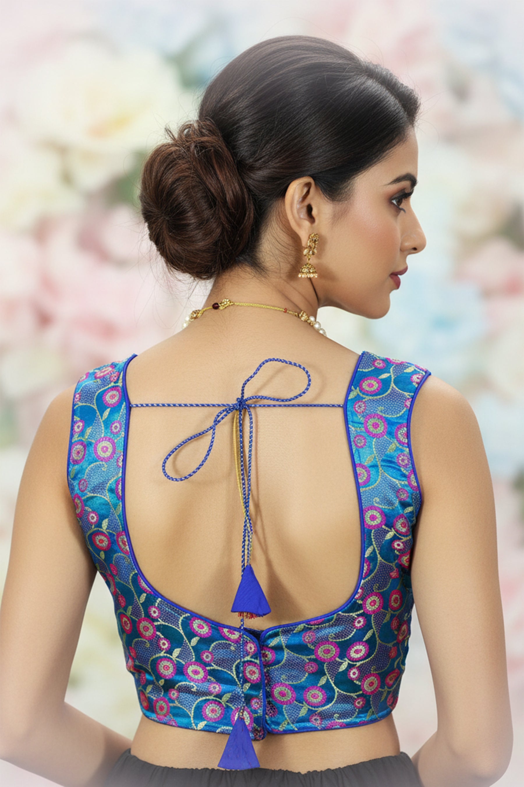 Sky Blue Readymade Padded Designer Blouse with Intricate Zari Woven Motifs, Sleeveless, Back Knot