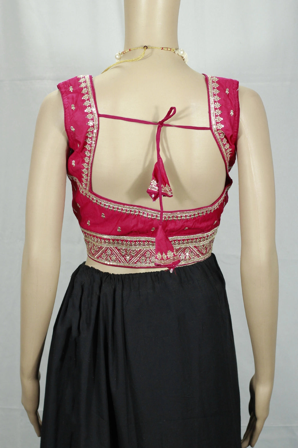 Red Zari Border Padded Designer Blouse with Deep Neckline, Sleeveless, Back Knot, Fully Stitched