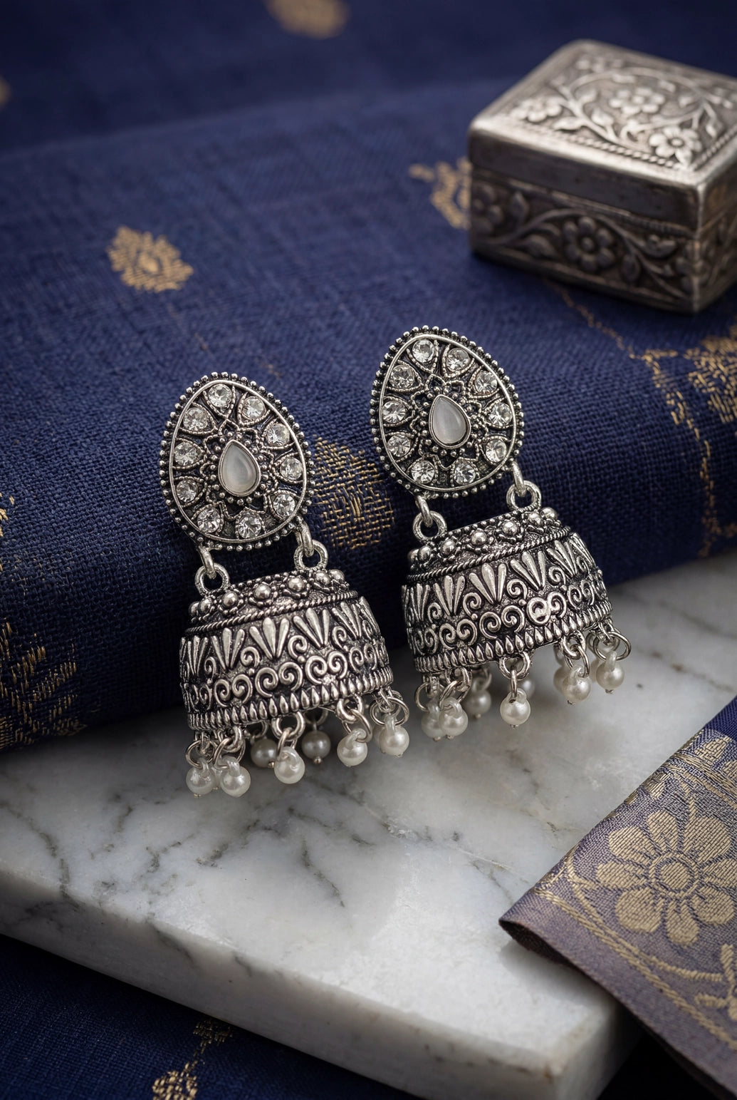 Oxidized Silver Tone Jhumka Earrings with Oval Stud Top & Filigree Teardrop Motif for Women - White