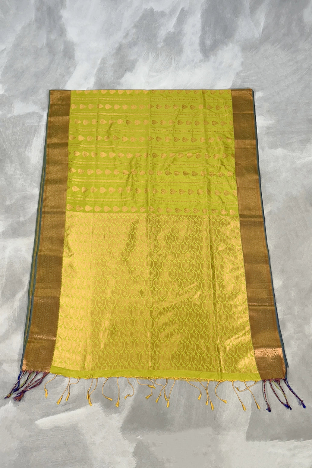 Lime Green Korvai Soft Silk Saree with Delicate Gold Zari Buttas and Traditional Floral Border
