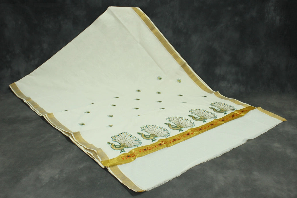 Fabric: Pure Kerala Cotton – lightweight, breathable,
• Design: Rich machine embroidery in Gold zari and thread with detaile