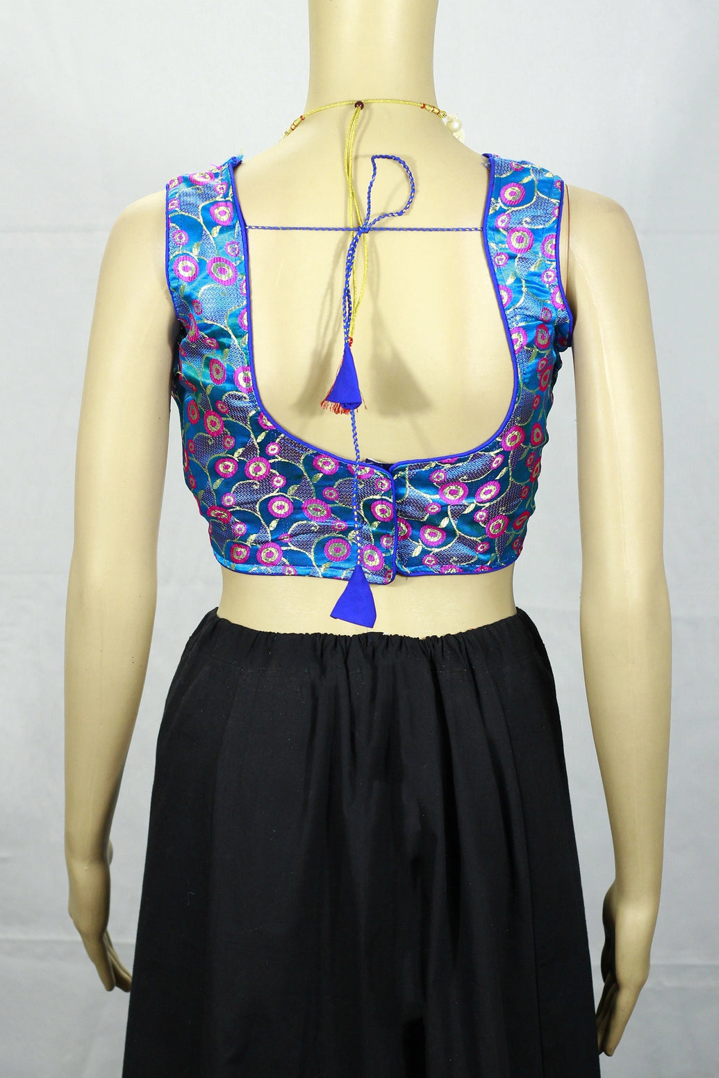 Sky Blue Readymade Padded Designer Blouse with Intricate Zari Woven Motifs, Sleeveless, Back Knot