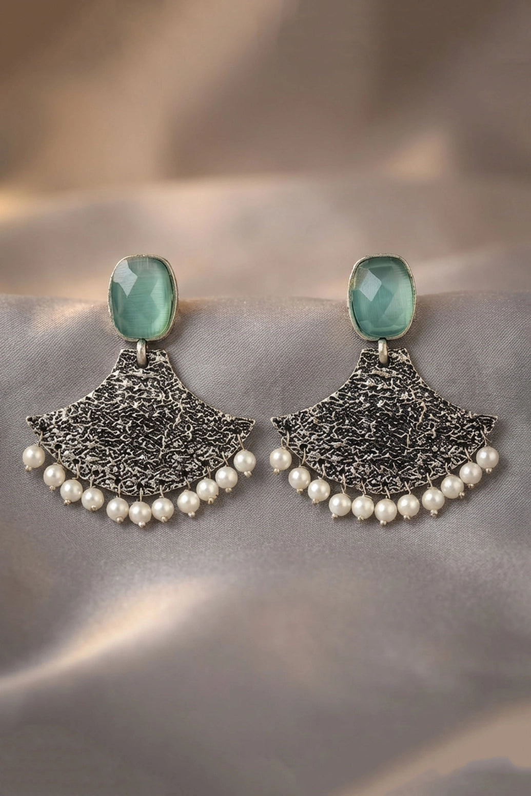 Mint Green Stone Textured Triangle Dangle Earrings with Pearl Drops for Festive Party Wear