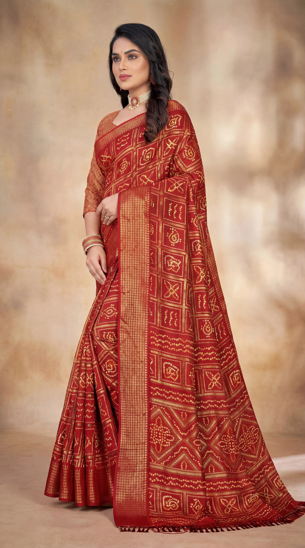 Red Bandhani Print Chiffon Saree with Gold Zari Geometric Motifs and Broad Elegant Border for Festive Wear