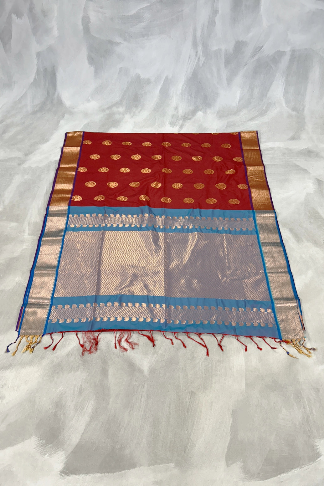Red Soft Silk Saree with Delicate Gold Zari Buttas and Traditional Floral Border