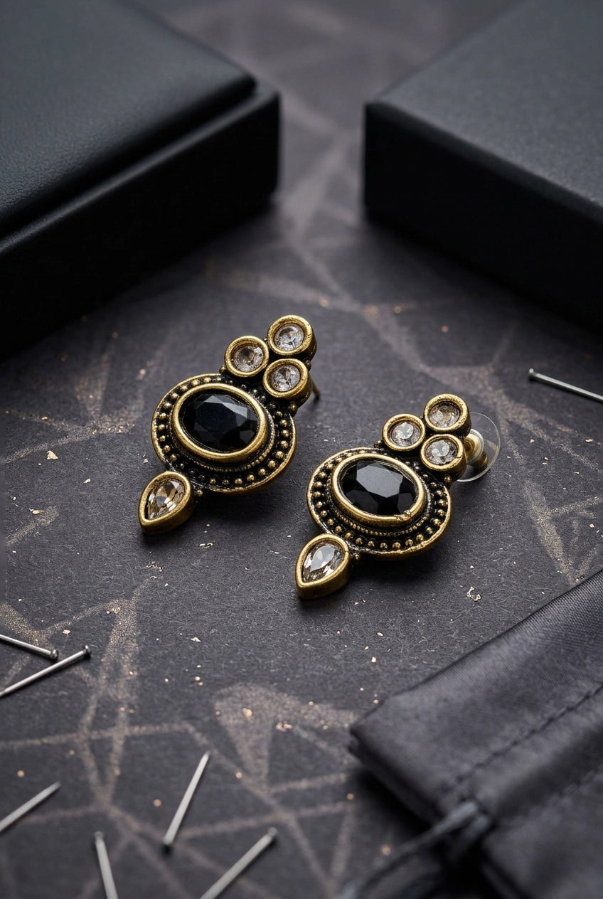 Antique-Style Black Stud Earrings with Oval Stone and Gold-Tone Bead Detailing for Traditional Wear