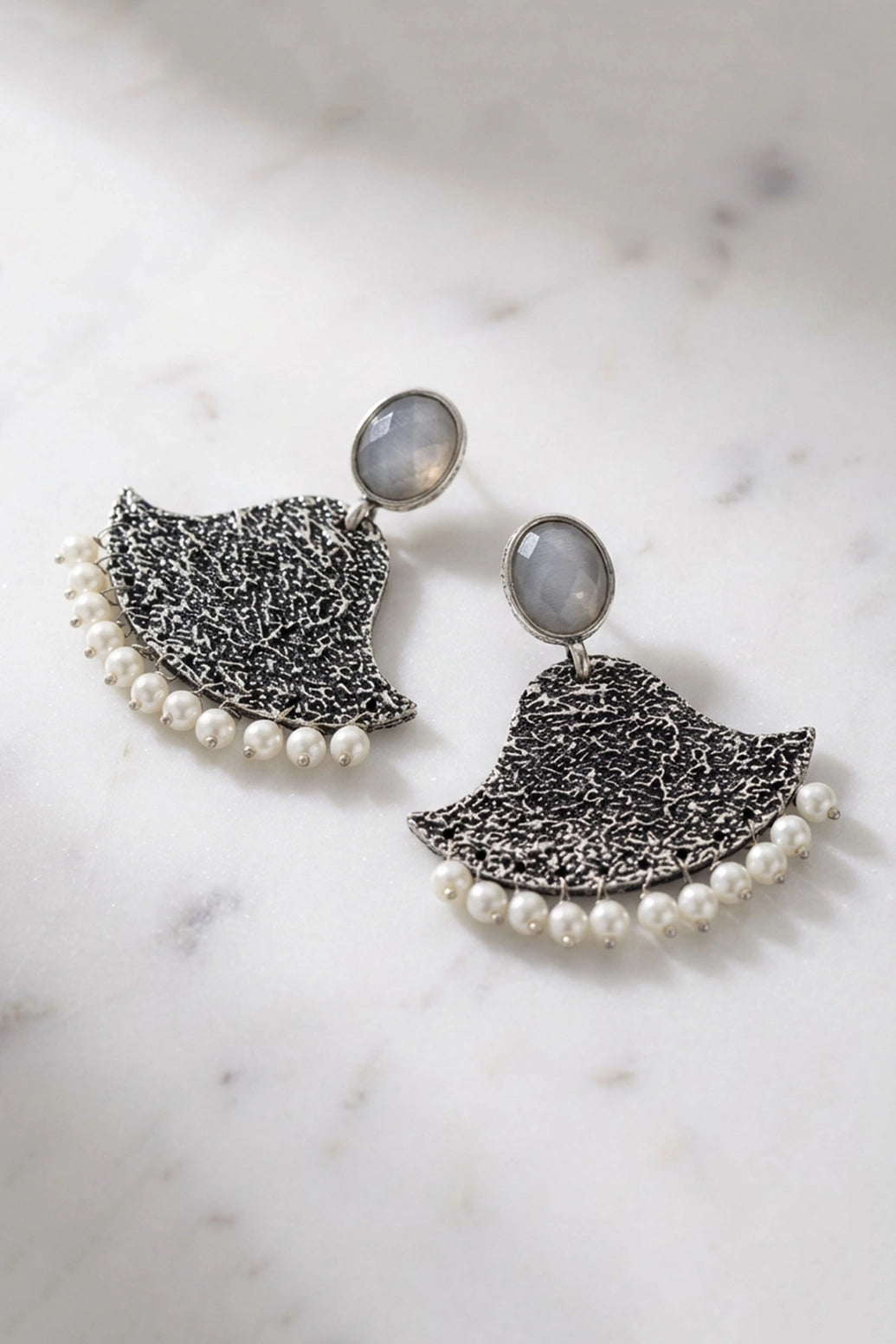 Grey Textured Triangular Stone Stud Earrings with Pearl Beaded Drop for Festive & Party Wear