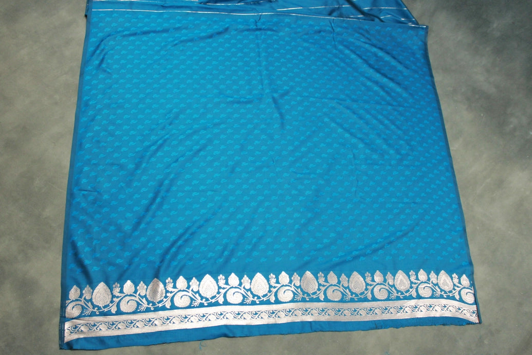 Peacock Blue Banarasi Soft Silk Saree with Zari Floral & Mango Motifs and Rich Border Pallu
