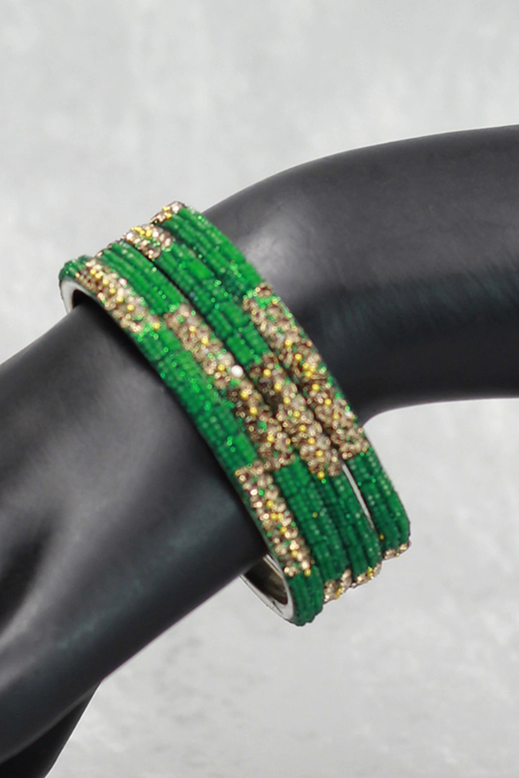 Multicolour crystal bangles set with vibrant bead detailing and gold-tone sparkle, perfect for festive wear, weddings, and mix-and-match eth