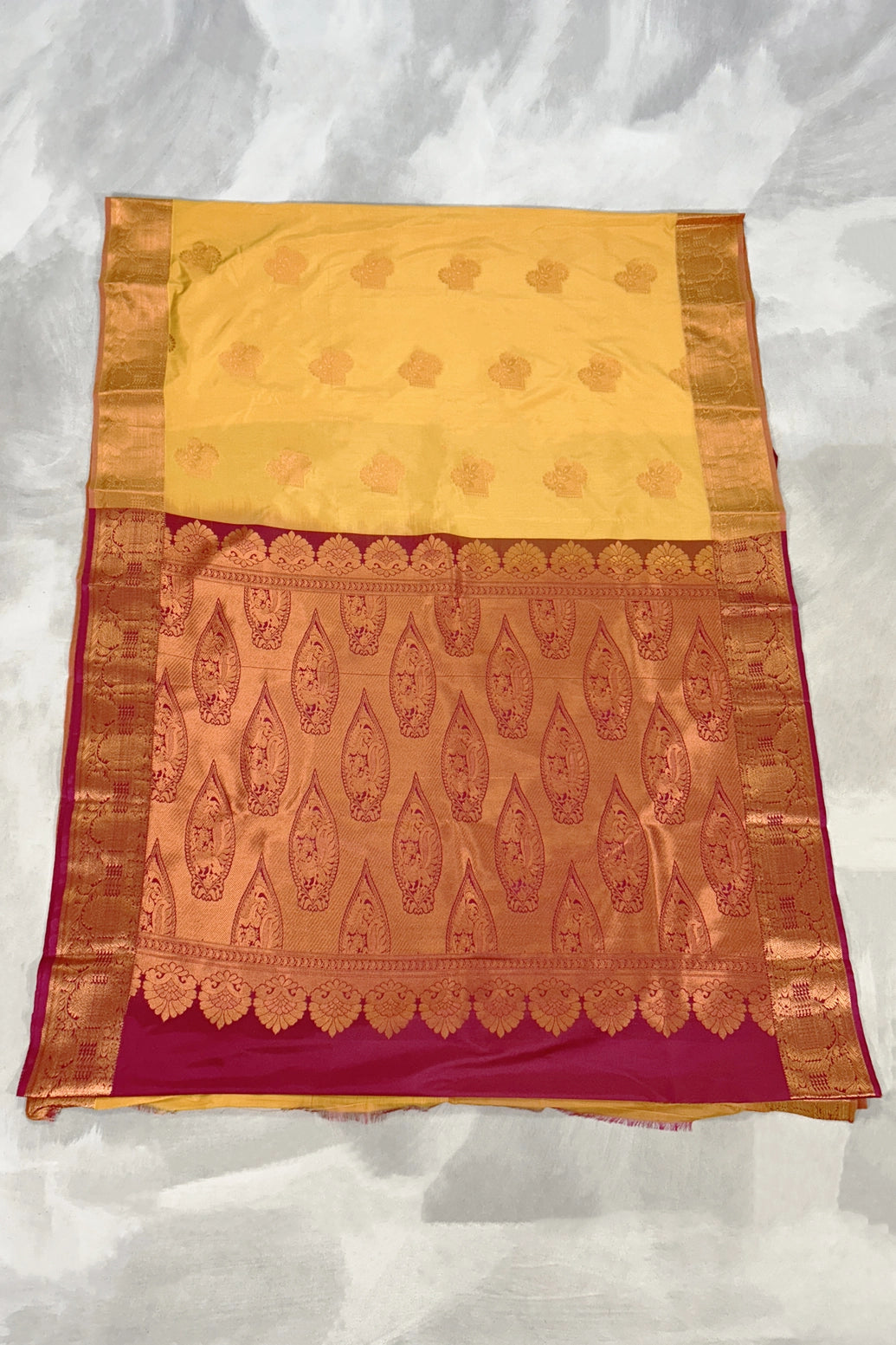 Mustard Border Soft Silk Saree with Delicate Gold Zari Buttas and Traditional Floral Border