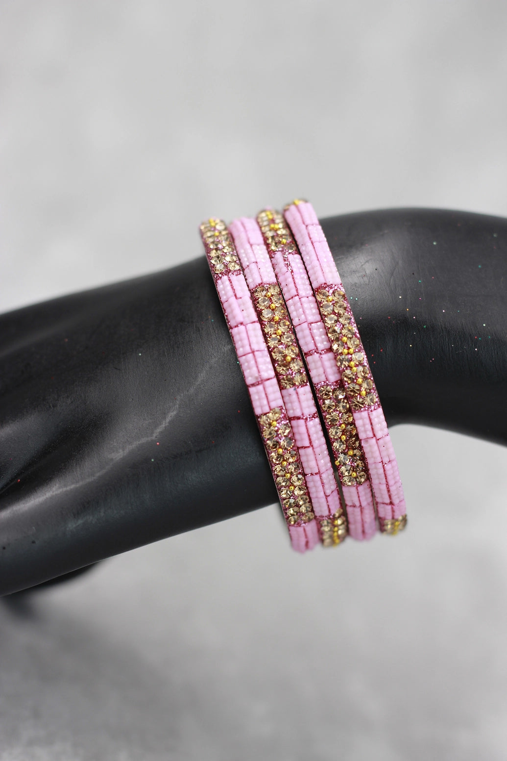 Multicolour crystal bangles set with vibrant bead detailing and gold-tone sparkle, perfect for festive wear, weddings, and mix-and-match eth