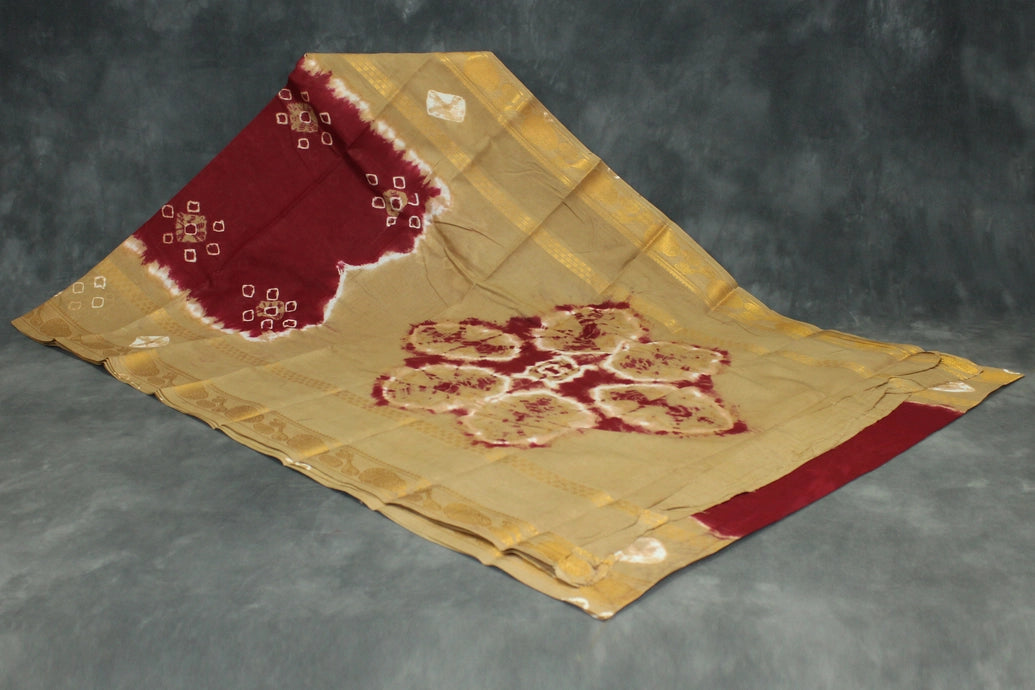 Maroon Sungudi Cotton Bandhani Saree with Golden Zari Border and Traditional Instrument Motifs, Unstitched Blouse Included Saree JCS Fashions