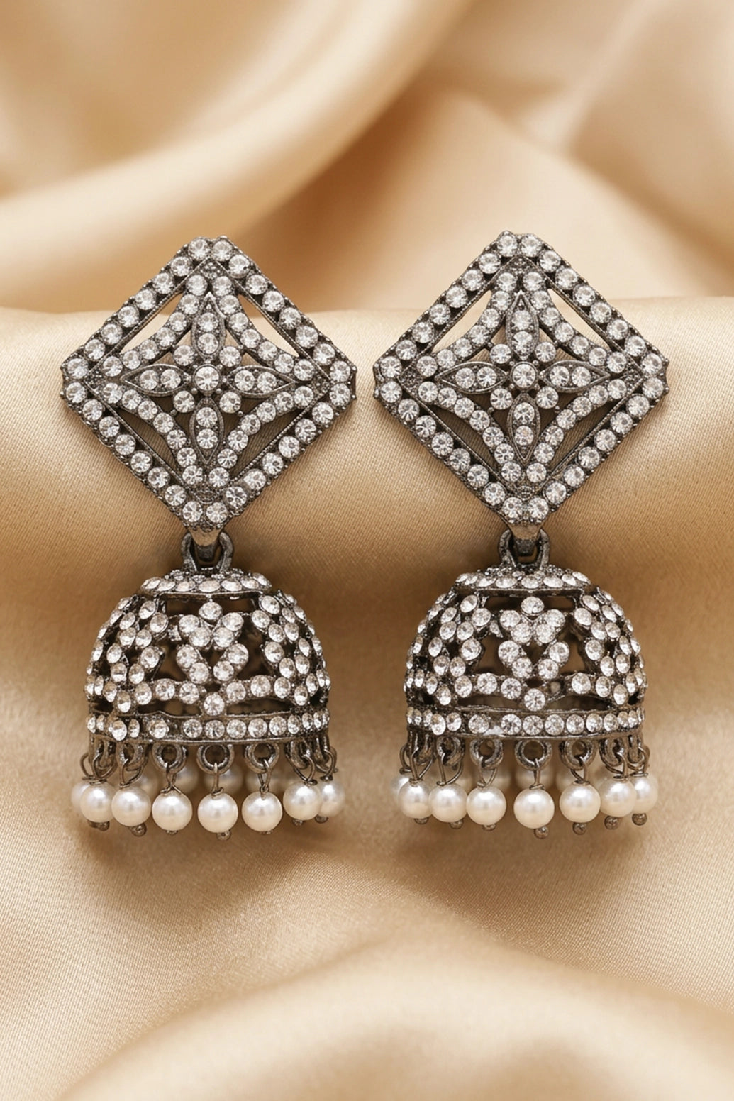 Oxidized Black-Silver Square Jhumka Earrings with Sparkling Stones and Pearl Drop Tassels