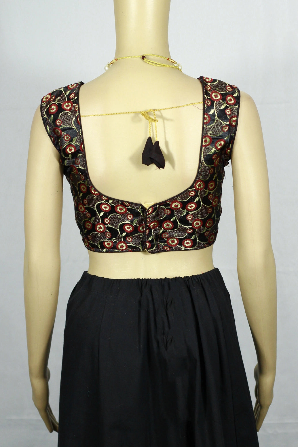 Black Readymade Designer Padded Blouse with Zari Circular Motifs, Back Knot and Sleeveless Fit