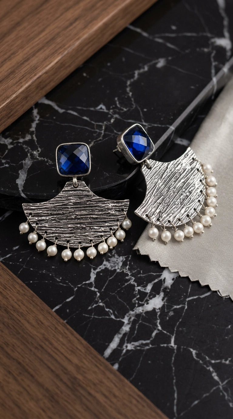 Blue Stone Textured Dangle Earrings with Pearl Drops for Festive Party Wear