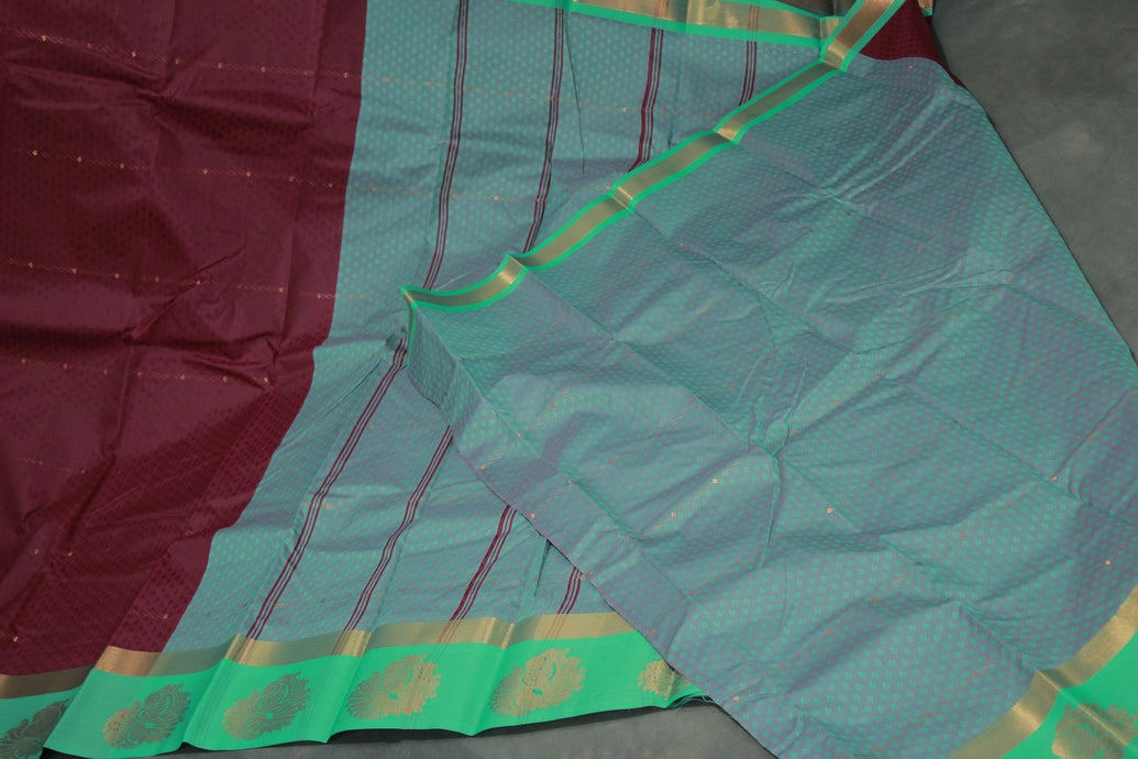 Maroon Emboss Silk Saree with Floral Design Satin Border and Blouse
