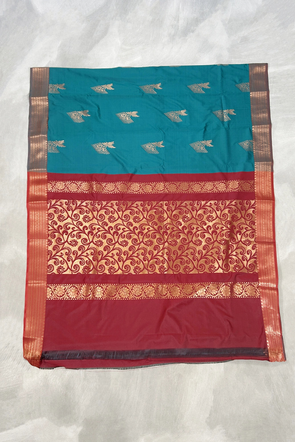 Teal Soft Silk Saree with Contrast Border and Gold Zari Buttas, Traditional Floral Border