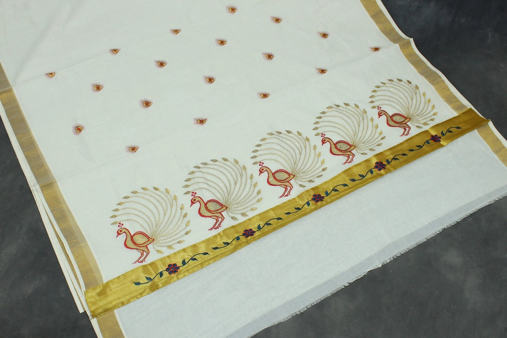 Fabric: Pure Kerala Cotton – lightweight, breathable,
• Design: Rich machine embroidery in Gold zari and thread with detaile