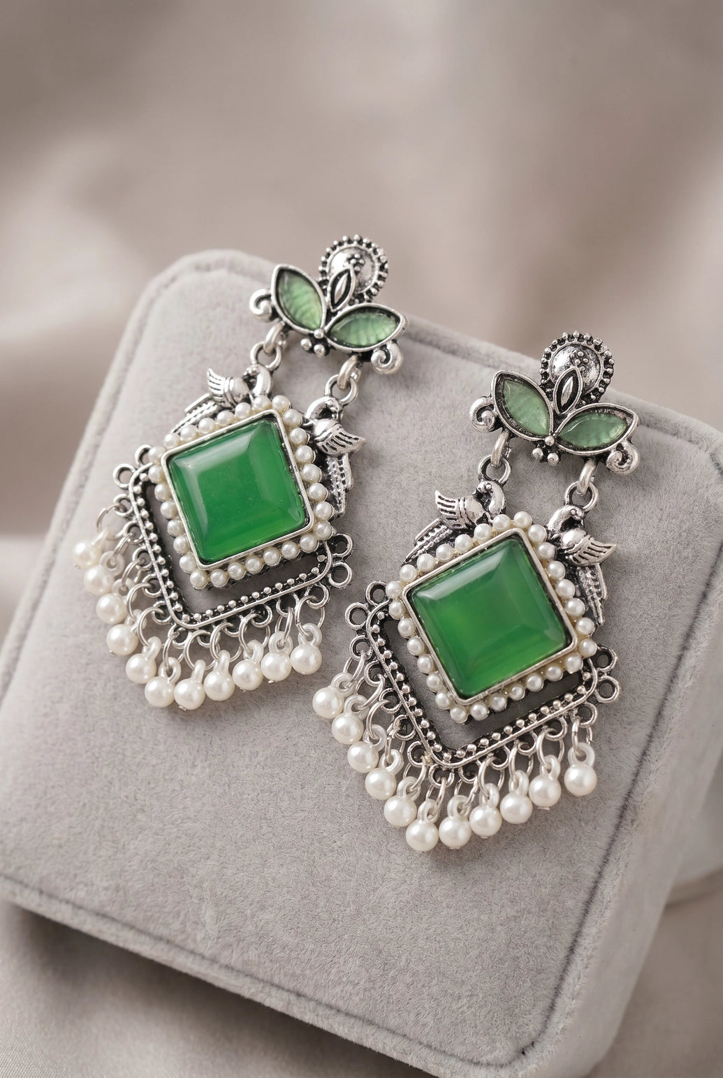 Green Oxidized Silver-Tone Teardrop Drop Earrings with Pearl & Floral Motifs for Traditional Wear