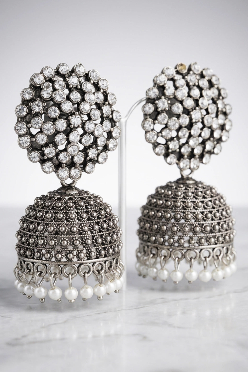 Oxidized Silver Tone Jhumka Earrings with White Stone Stud Top and Pearl Drop Dangles
