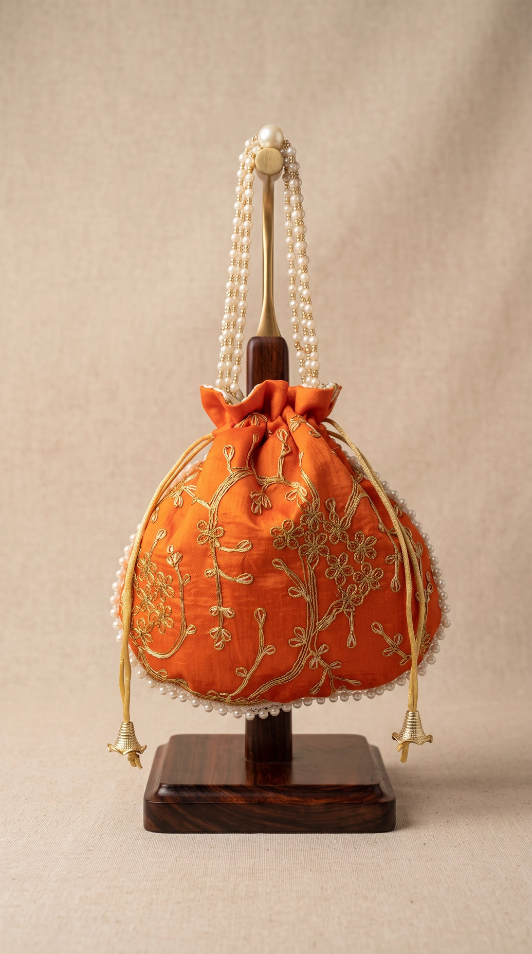 Orange Embroidered Pearl-Trim Potli Bag with Drawstring, Gold Floral Work for Wedding Festive Return Gifts