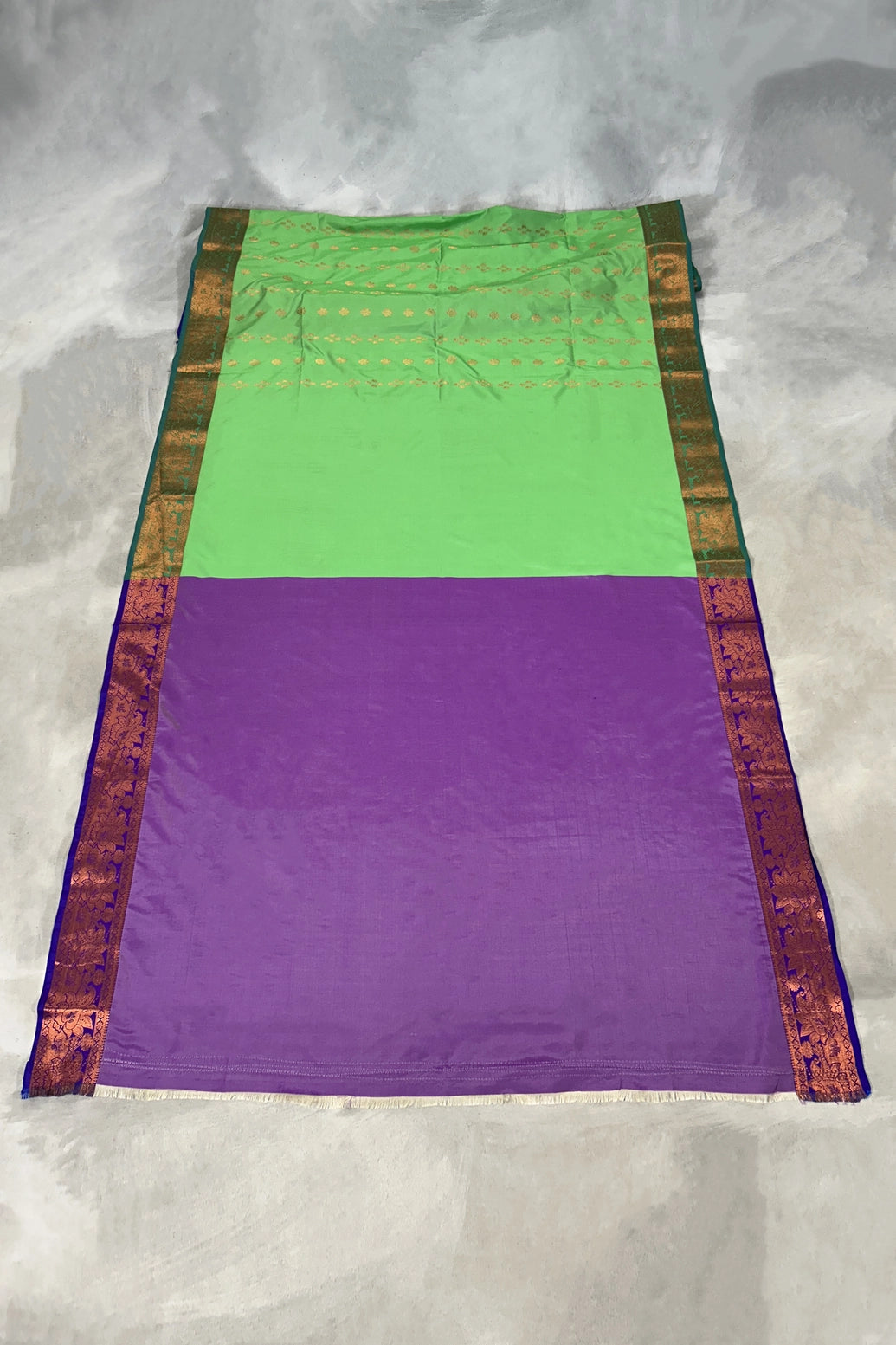 Green Korvai Soft Silk Border Saree with Delicate Gold Zari Buttas and Traditional Floral Border