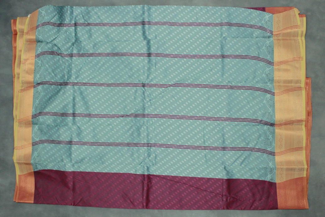 Maroon Emboss Silk Saree with Contrast Zari-Style Border and Semi Silk Design
