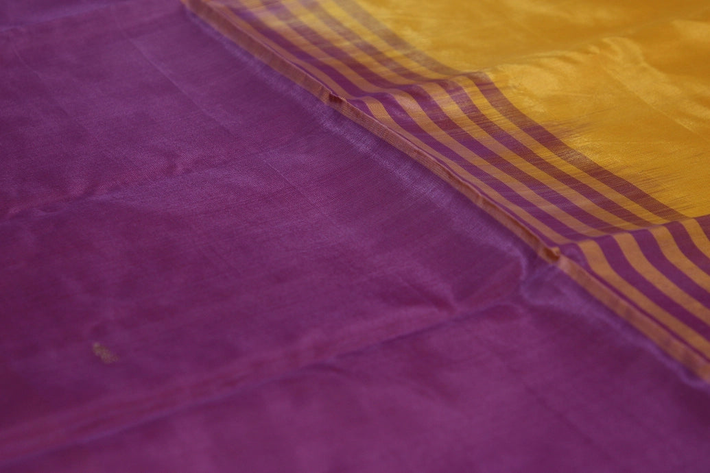 Vaazhai Naar (Banana Pith) Orange Borderless Saree with Purple Pallu and Small Buttas