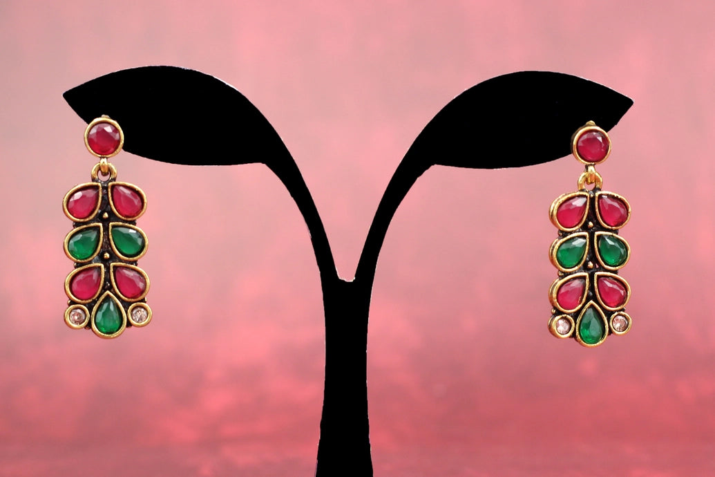 Maroon & Red Gold-Tone Teardrop Leaf Earrings with Antique Finish for Festive Wear Jewelry JCS Fashions