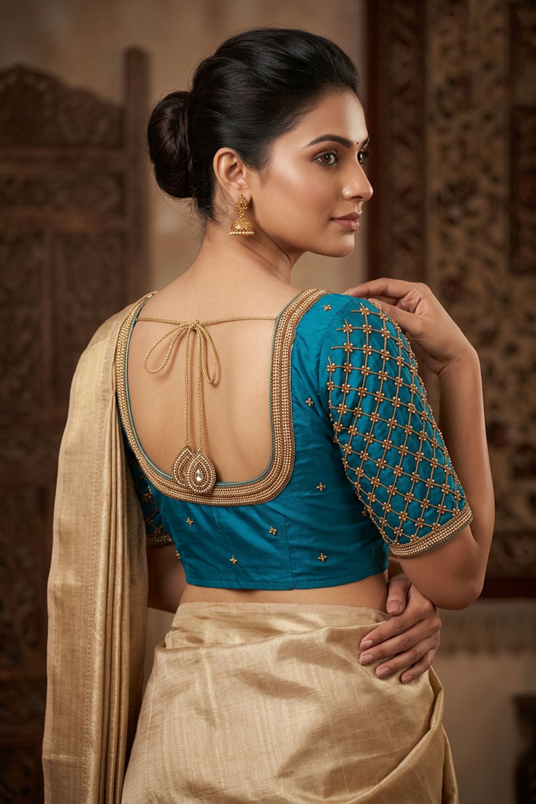 Blue Heavy Aari Work Blouse - With Latkan - AI Model Photo 1