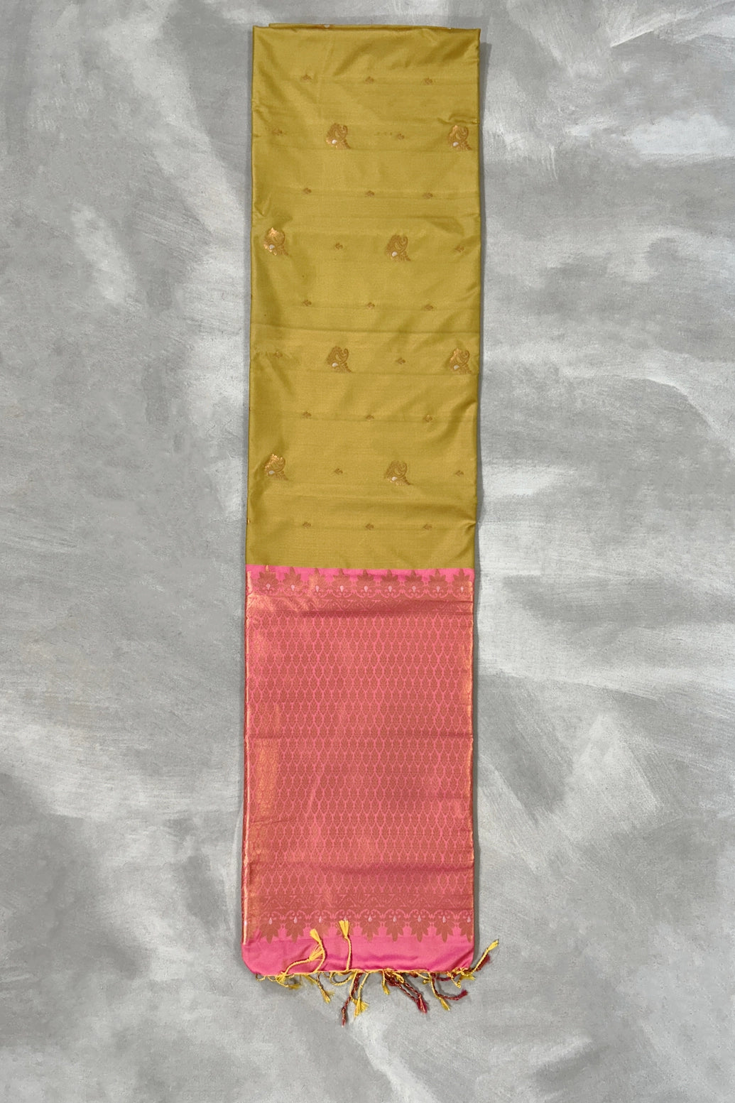 Mustard Korvai Soft Silk Saree with Delicate Gold Zari Buttas and Traditional Floral Border