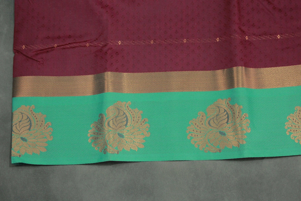 Maroon Emboss Silk Saree with Floral Design Satin Border and Blouse