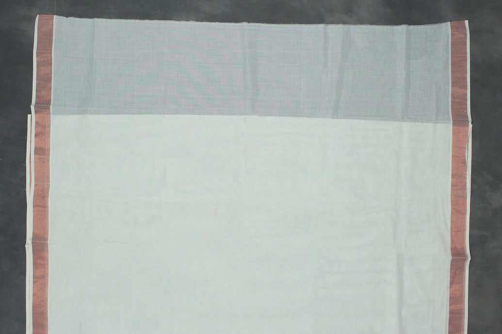 Fabric: Pure Kerala Cotton – lightweight, breathable,
• Design: Rich machine embroidery in copper zari thread with detailed