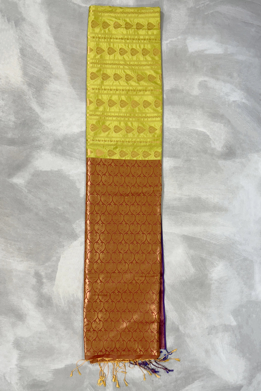 Orange Soft Silk Saree with Delicate Gold Zari Buttas and Floral Border