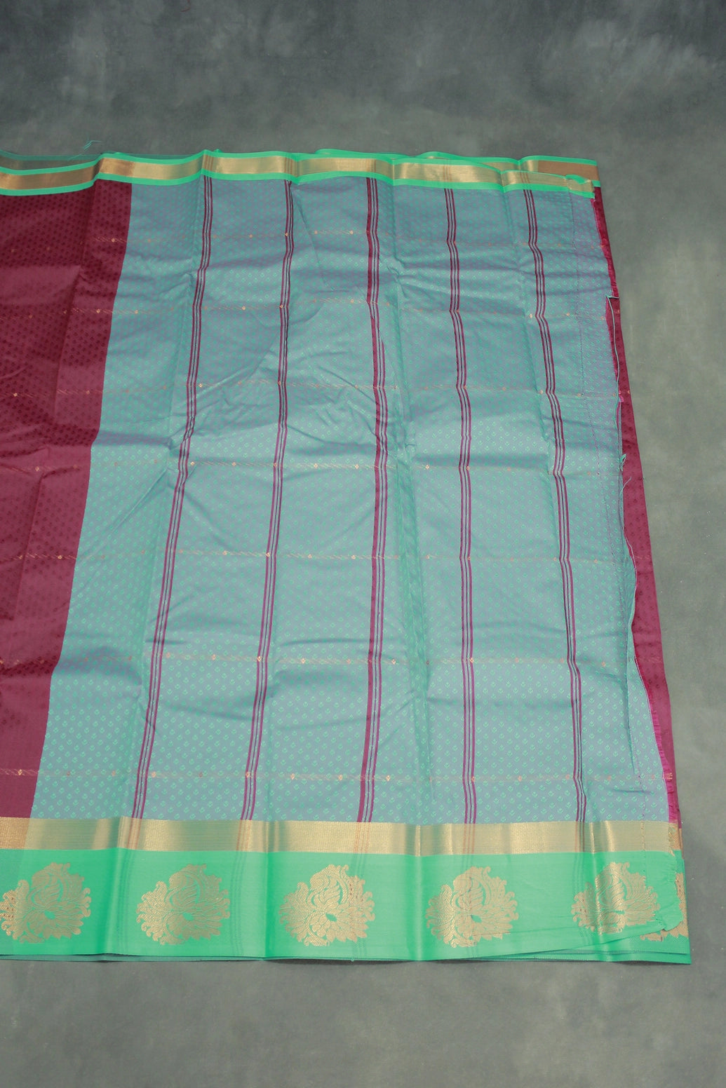 Maroon Emboss Silk Saree with Floral Design Satin Border and Blouse