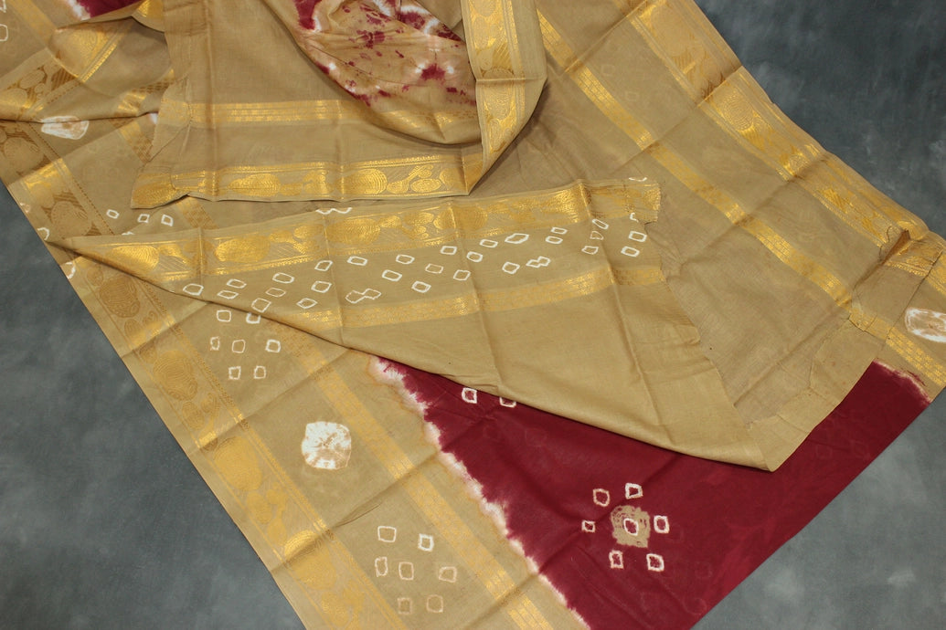 Maroon Sungudi Cotton Bandhani Saree with Golden Zari Border and Traditional Instrument Motifs, Unstitched Blouse Included Saree JCS Fashions