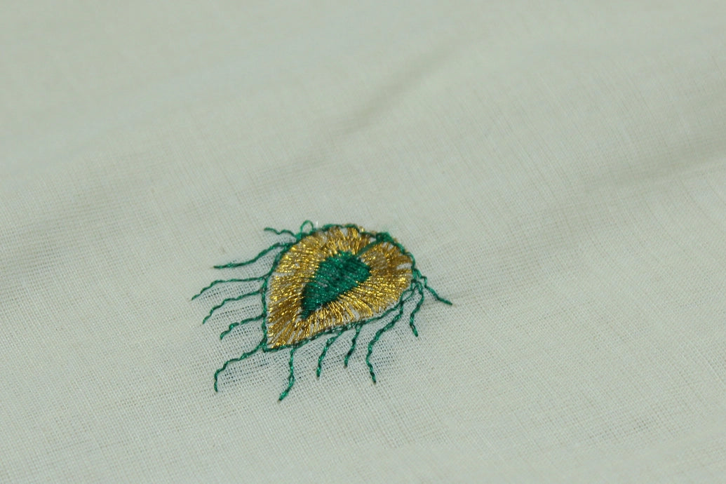 Fabric: Pure Kerala Cotton – lightweight, breathable,
• Design: Rich machine embroidery in Gold zari and thread with detaile