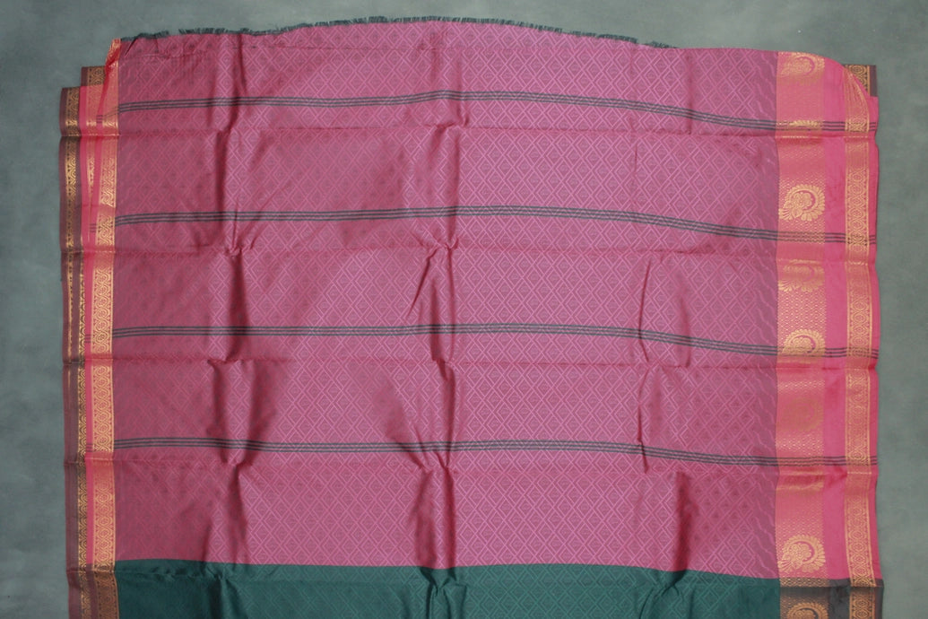 Dark Green Emboss Silk Saree with Traditional Border Design