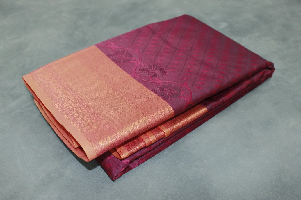 Maroon Emboss Silk Saree with Contrast Zari-Style Border and Semi Silk Design