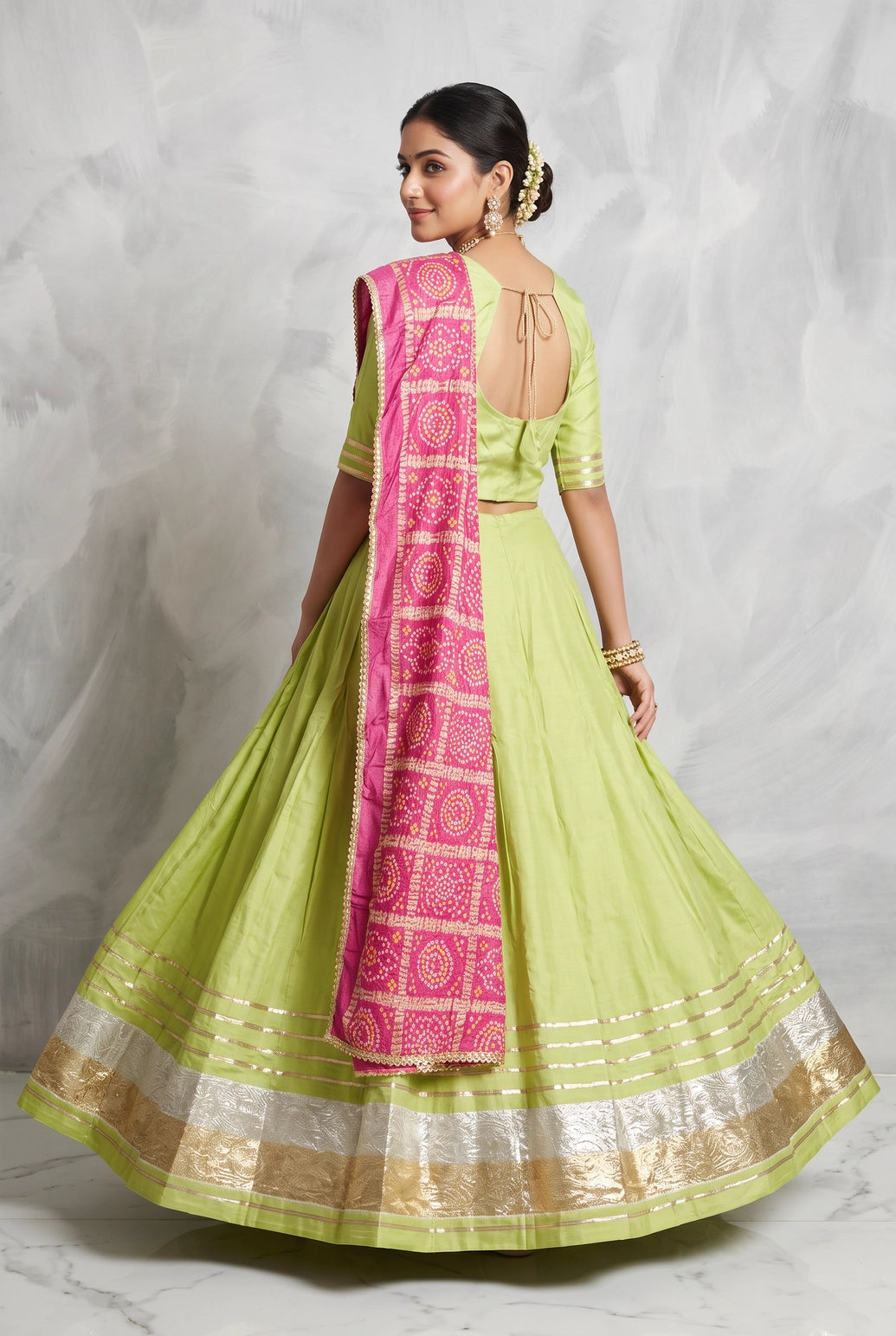Green Designer Navratri Chaniya Choli with Gold-Silver Tissue Border and Plain Silk Lehenga Skirt