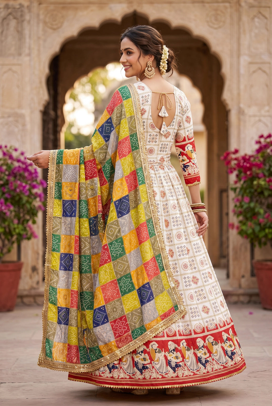 Red Designer Navratri Chaniya Choli with Folk-Art Border and Flared Skirt for Festive Evening Wear
