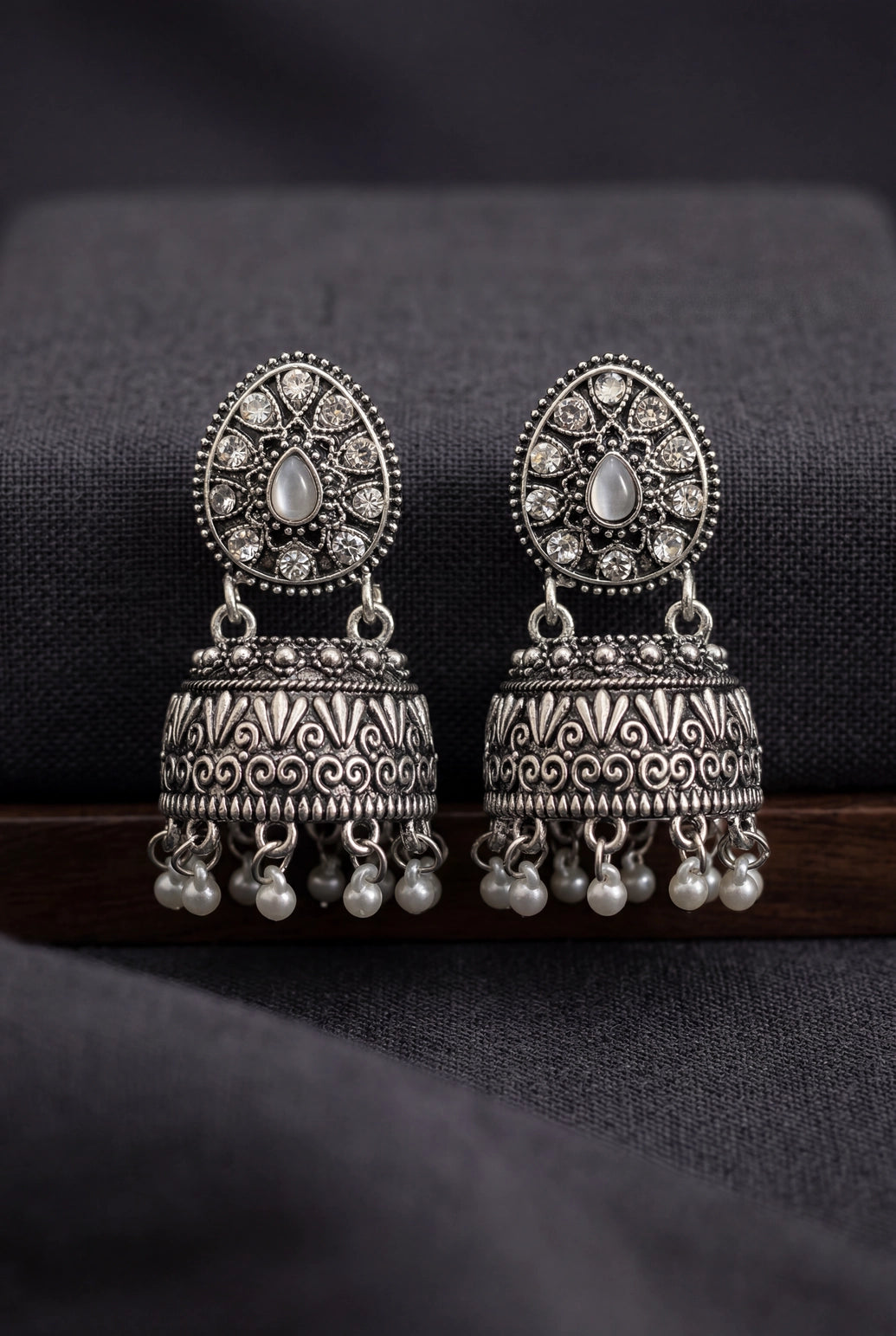 Oxidized Silver Tone Jhumka Earrings with Oval Stud Top & Filigree Teardrop Motif for Women - White