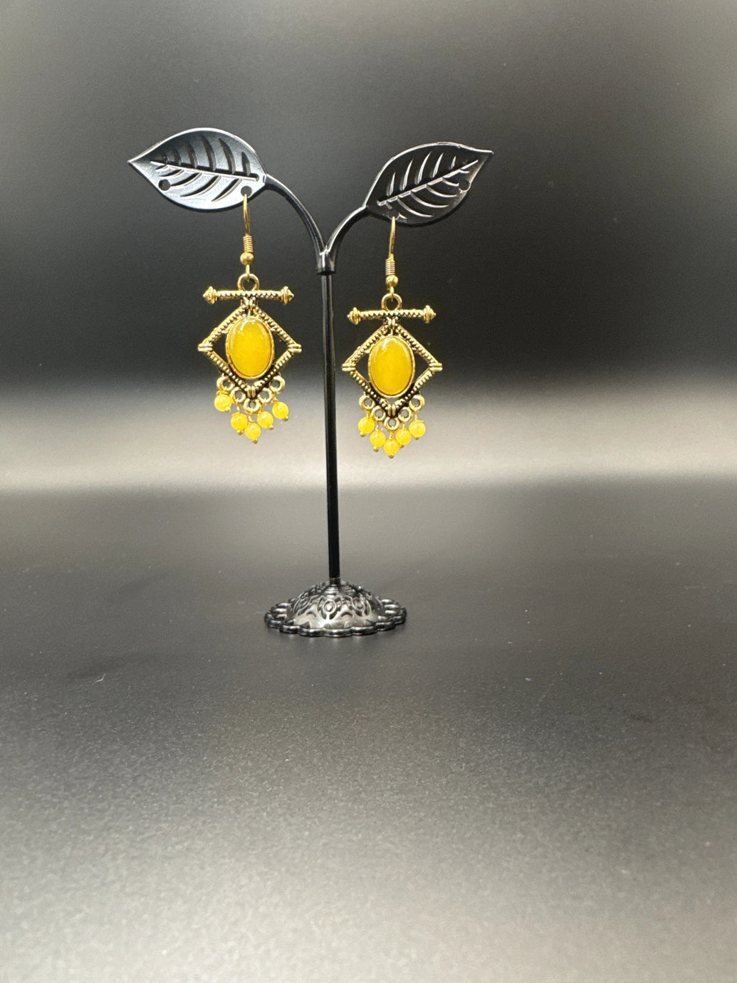 Antique gold-tone drop earrings with stone cabochon & bead dangles