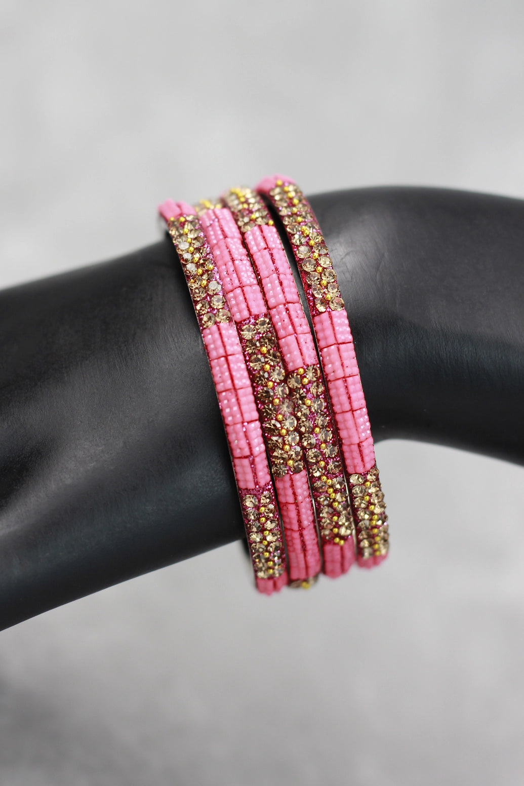 Multicolour crystal bangles set with vibrant bead detailing and gold-tone sparkle, perfect for festive wear, weddings, and mix-and-match eth