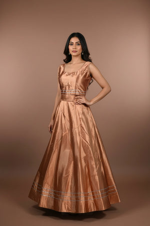 Peach Silk Lehenga with Silver Stripe Border and Sleeveless High-Neck Blouse