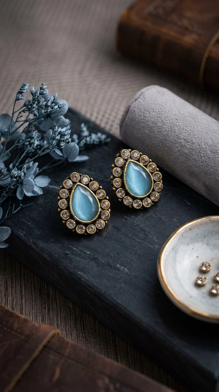 Sea Blue Teardrop Stud Earrings with Gold-Tone Halo and Crystal Accents for Festive Wear - Sea Blue