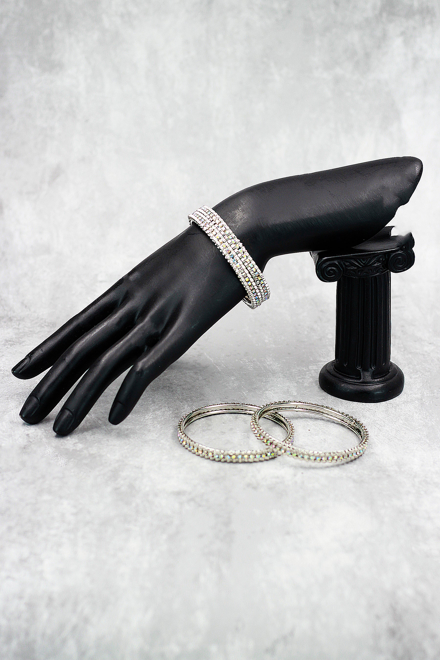 Silver-tone crystal bangles with sleek sparkle, perfect for festive wear, parties, and elegant ethnic styling.
