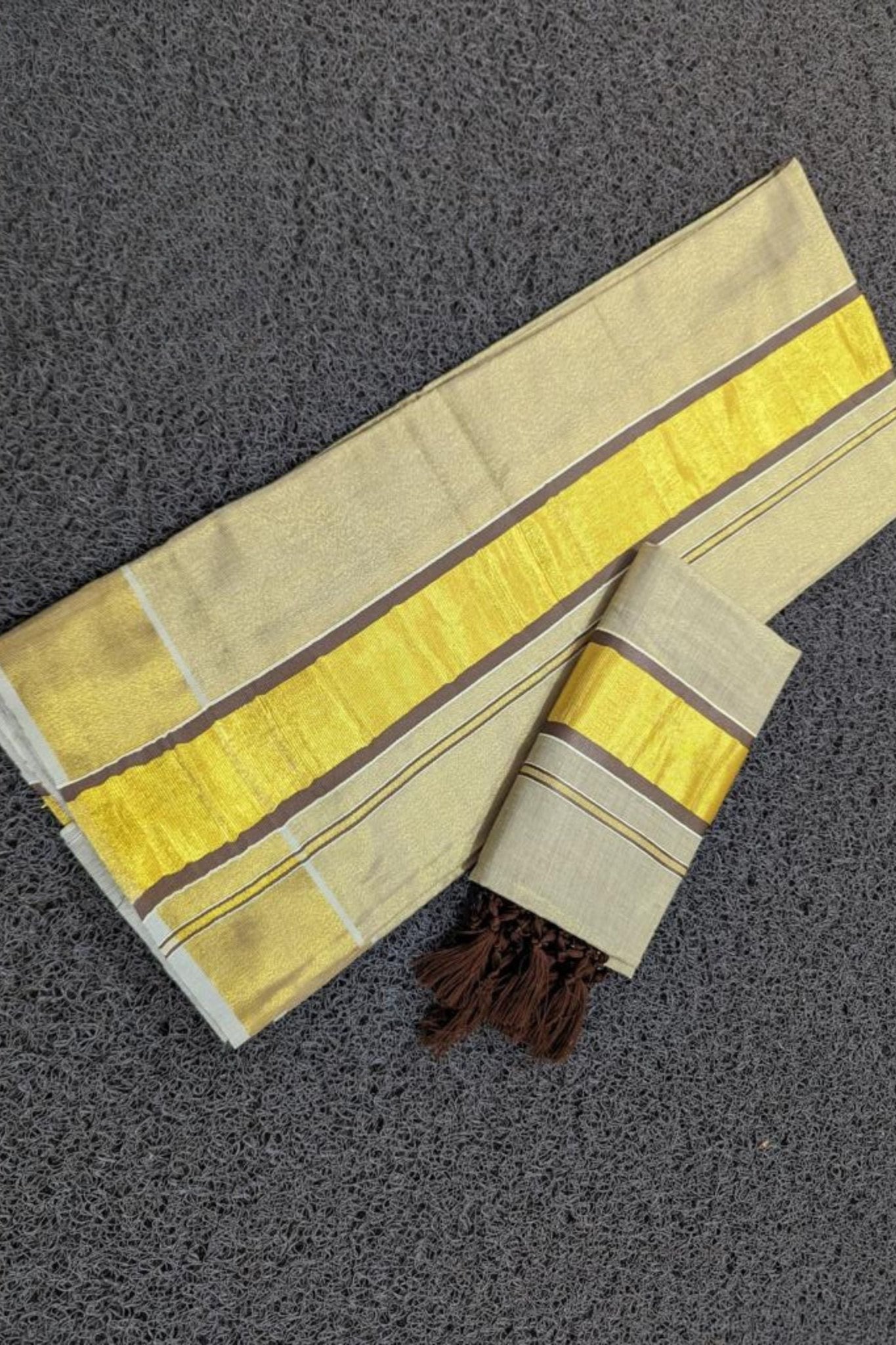Chic Saree Onam Collection: Color Tissue Set Mundu with Tassel Detailing Saree JCS Fashions Coffee 2.8*2 mtrs