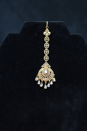 in Gold: AD Stone Tikka for Divine